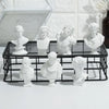 A collection of plaster bust miniatures depicting classical Greek mythology figures.