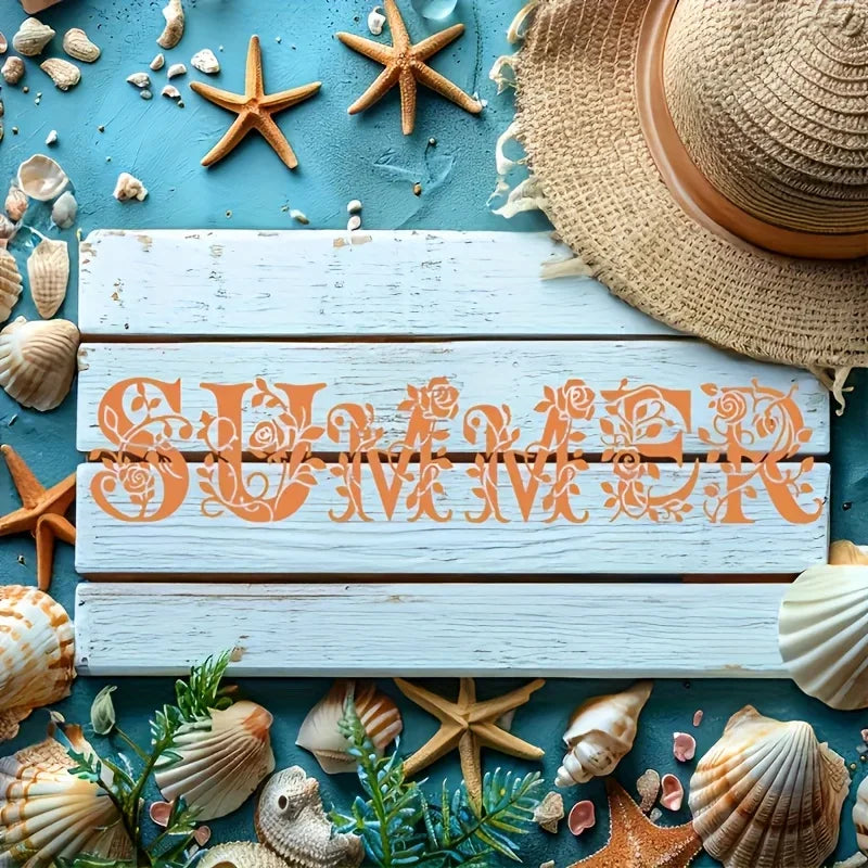 Wooden planks display reusable floral alphabet stencils for painting and decals surrounded by seashells and starfish