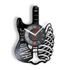 A black guitar-shaped wall clock with a face displaying the time, featuring vinyl record design elements.