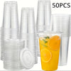 A collection of clear disposable plastic cups with lids and a glass of orange juice are shown.