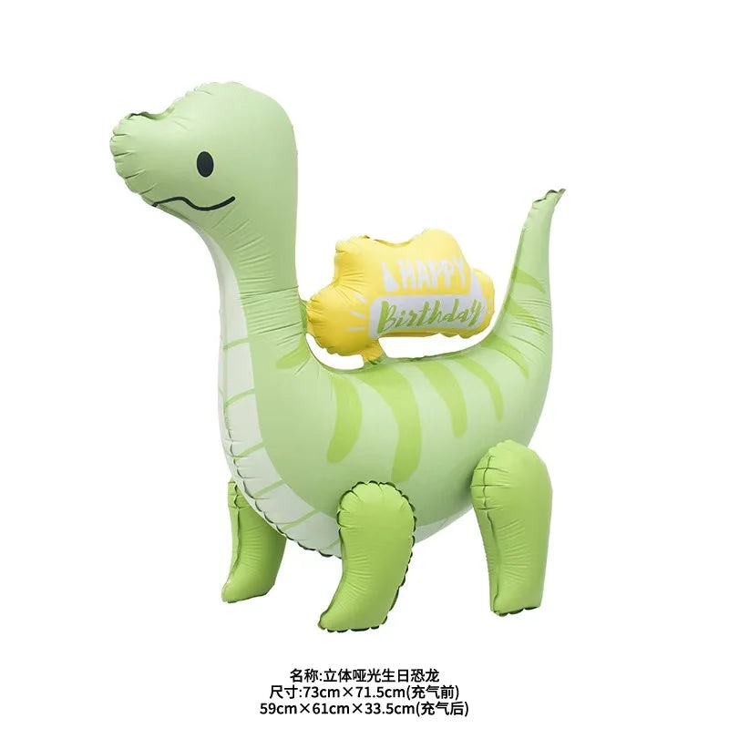 A light green inflatable dinosaur balloon decoration with yellow lettering that reads Happy Birthday