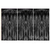 Three panels of metallic foil fringe curtains used as a party backdrop decor.