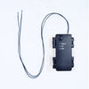 A black electronic timer device with a wire, used for Halloween and decor.