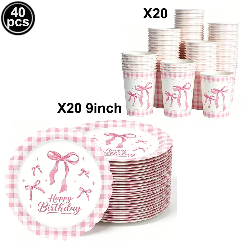 A set of 20 pink and white striped paper cups with pink bows for a birthday party.