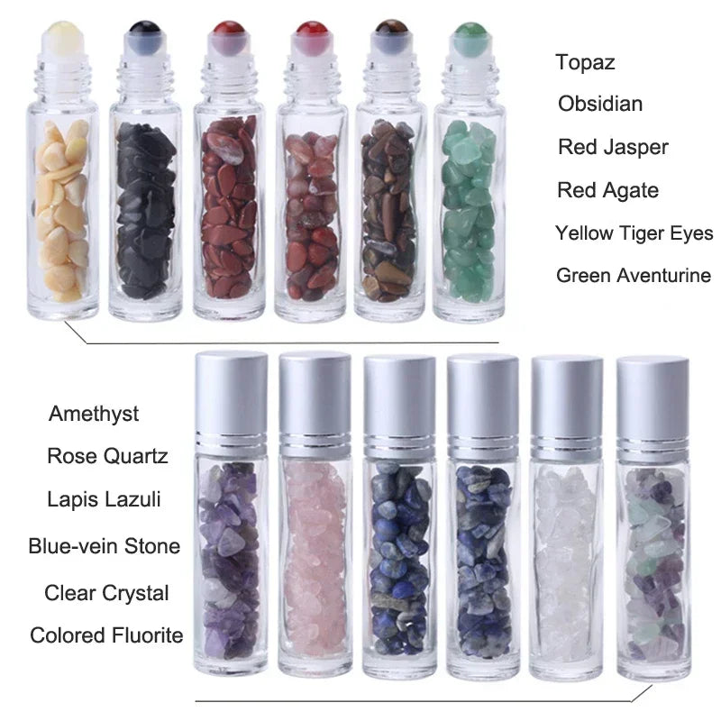 A collection of ten glass bottles filled with various semi-precious stone roller balls including topaz, obsidian, jasper, aga