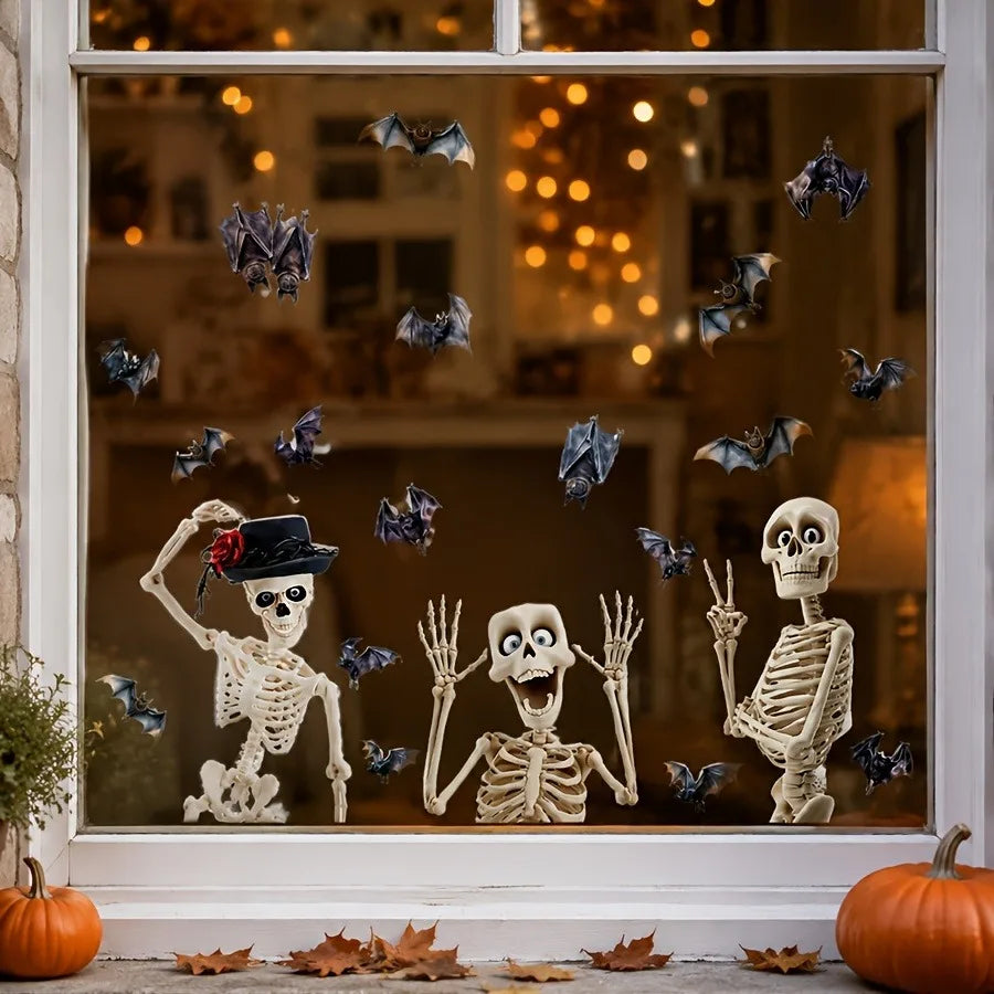 A window featuring a Halloween theme with skulls and bats, including skeletal figures and flying bats.