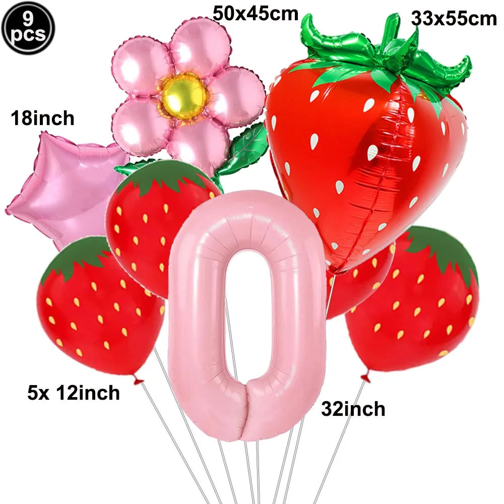 A party kit featuring nine pink and red strawberry balloons, including large fruit shapes and a number balloon.
