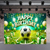 A vibrant soccer field backdrop for a birthday celebration featuring a football, balloons, and festive decorations.