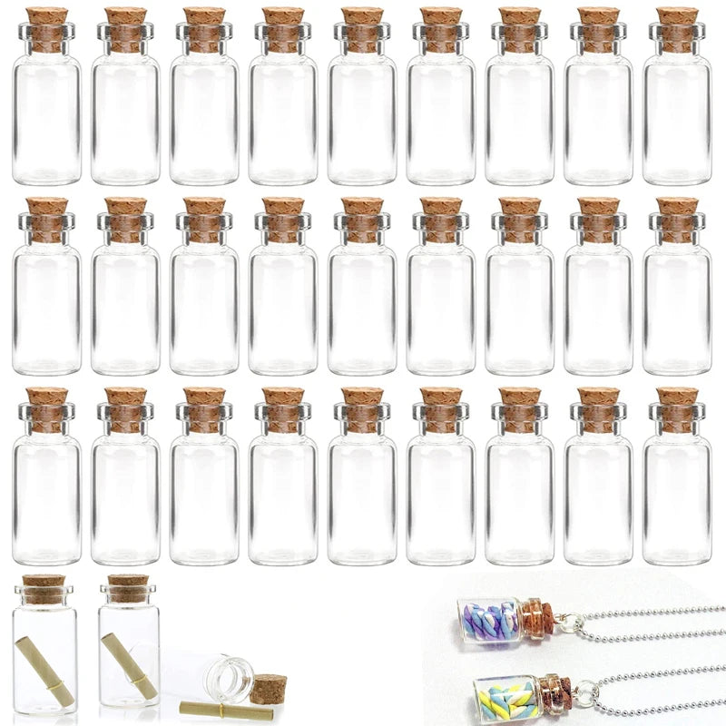 A collection of mini glass bottles with cork stoppers, some filled with colorful materials and others featuring silver chains