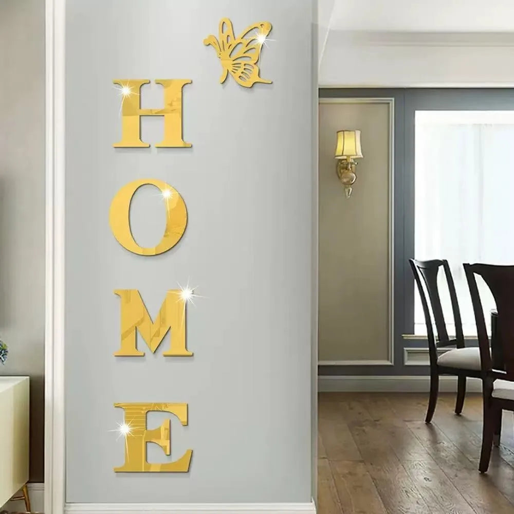 Gold acrylic mirror wall stickers shaped like the letters H O M E