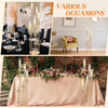 A long gold LED candle holder with five arms is displayed on a table setting for elegant decor.