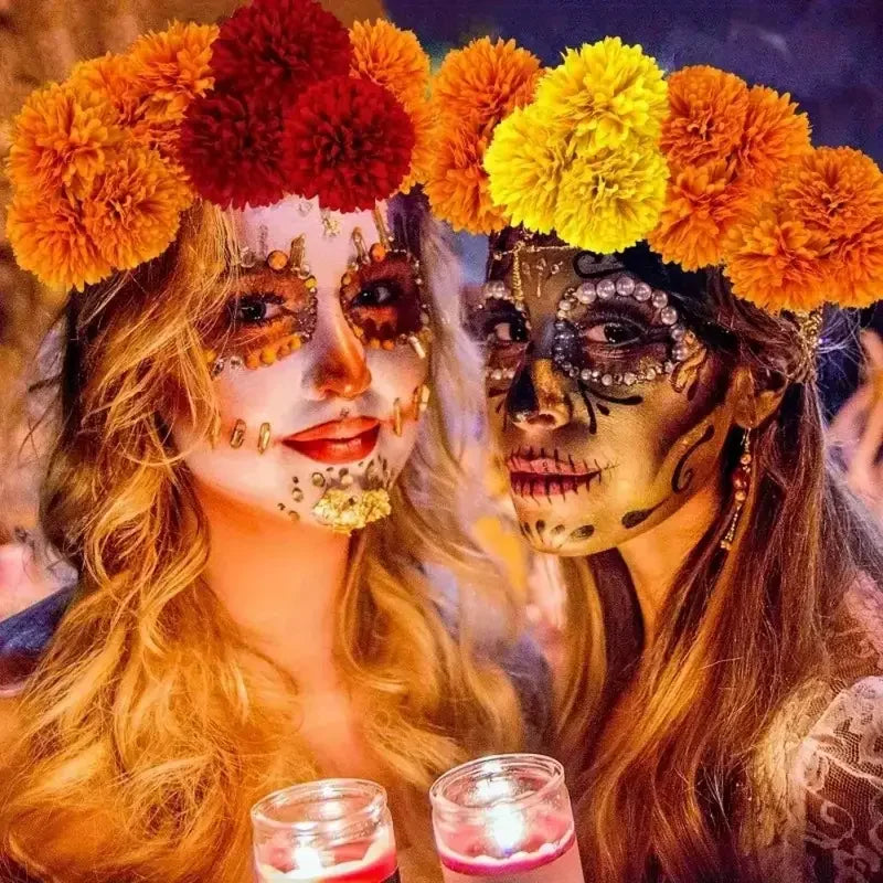 Two women wearing elaborate face paint and flower crowns for festive decor