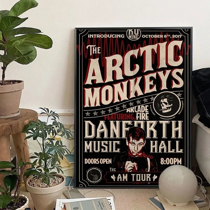 A canvas art print featuring the Arctic Monkeys band name in a distressed font on a black background.