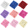 A collection of 12 foam rose stems in various shades of blue, red, purple, pink, and cream.