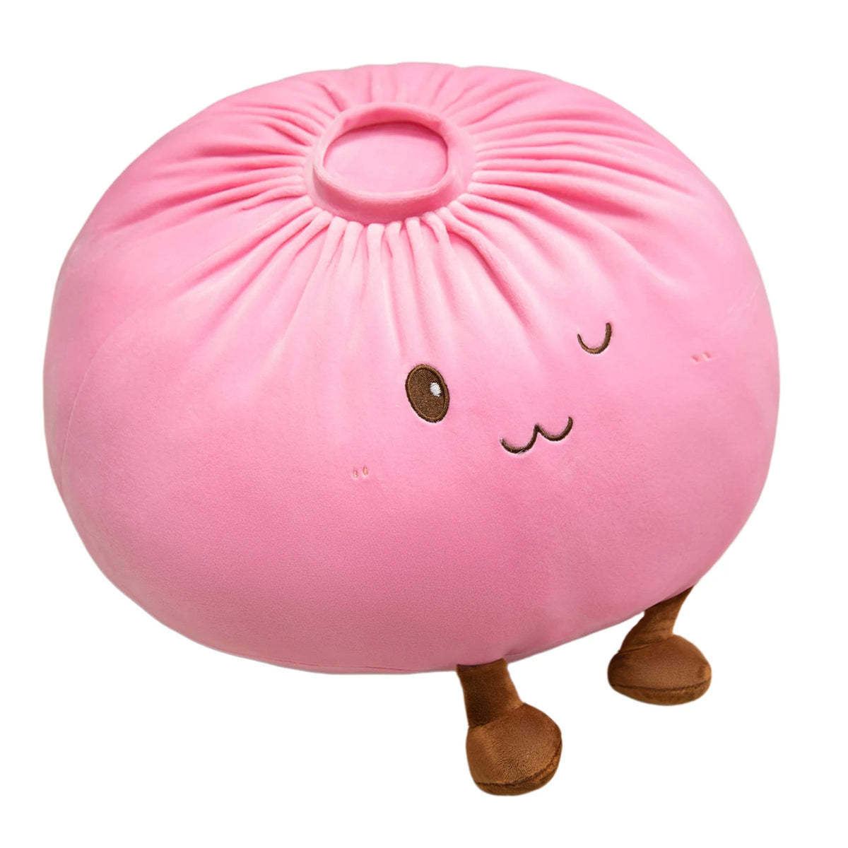A pink dumpling plush pillow with small brown feet and cute facial features.