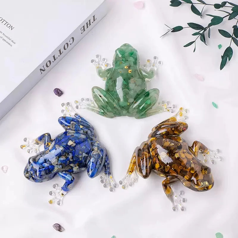 A set of crystal frog resin craft decorations featuring green, blue, and amber colored frogs.