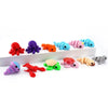 A collection of colorful, articulated 3D printed marine animal figurines including a red crab, purple octopus, orange lobster