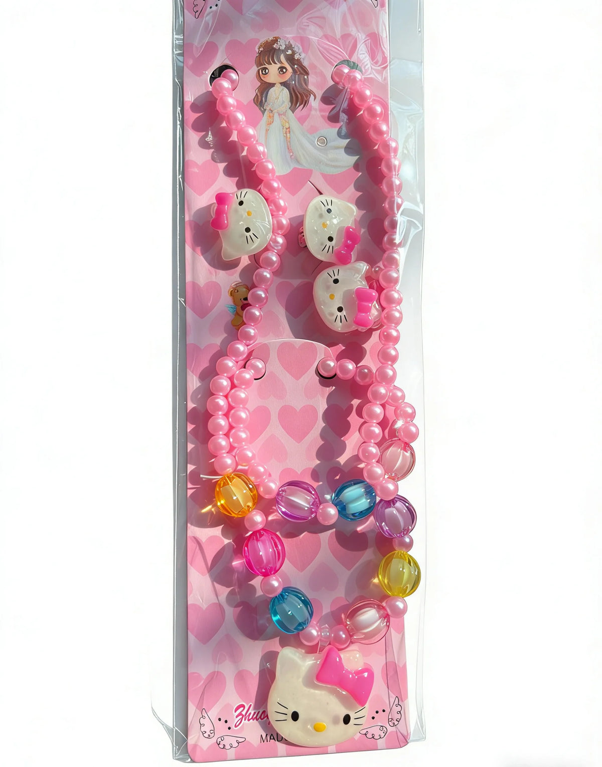 A pink beaded jewelry set featuring a butterfly hair clip and various pink and clear beads.
