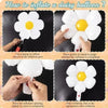 Instructions showing how to inflate a white daisy balloon using a pump and hand pressure.