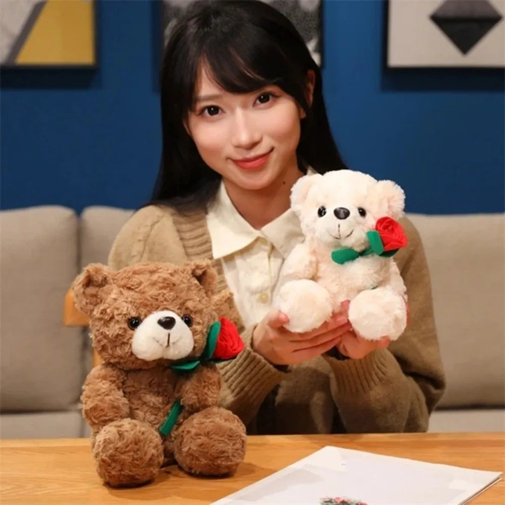 A woman holds a white teddy bear plush toy with a red rose, set against a blue background.