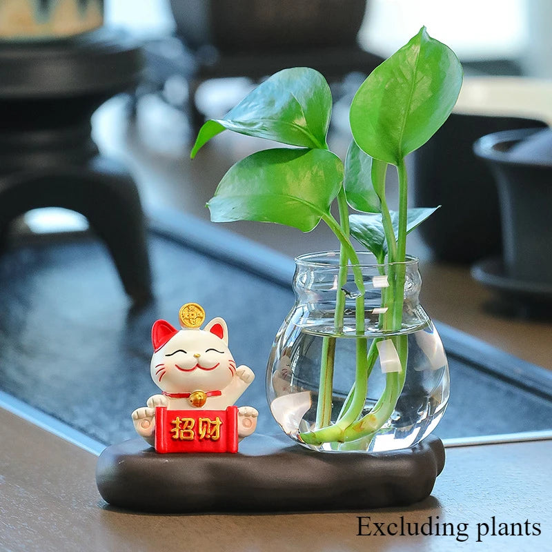 Mini resin desk ornament featuring a green ivy plant and a small white lucky cat in a glass vase.