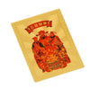A gold-colored sticker featuring a depiction of a deity with a red banner and intricate patterns.