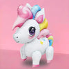 A white dinosaur balloon decoration with pink and blue accents, featuring a cute face and body.
