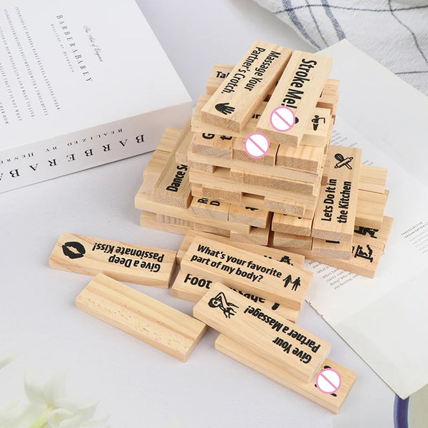 Un ensemble de blocs de construction en bois avec diverses phrases comme Massez votre partenaire et Donnez un baiser profond