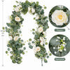 Artificial eucalyptus and rose garland featuring white flowers and green foliage