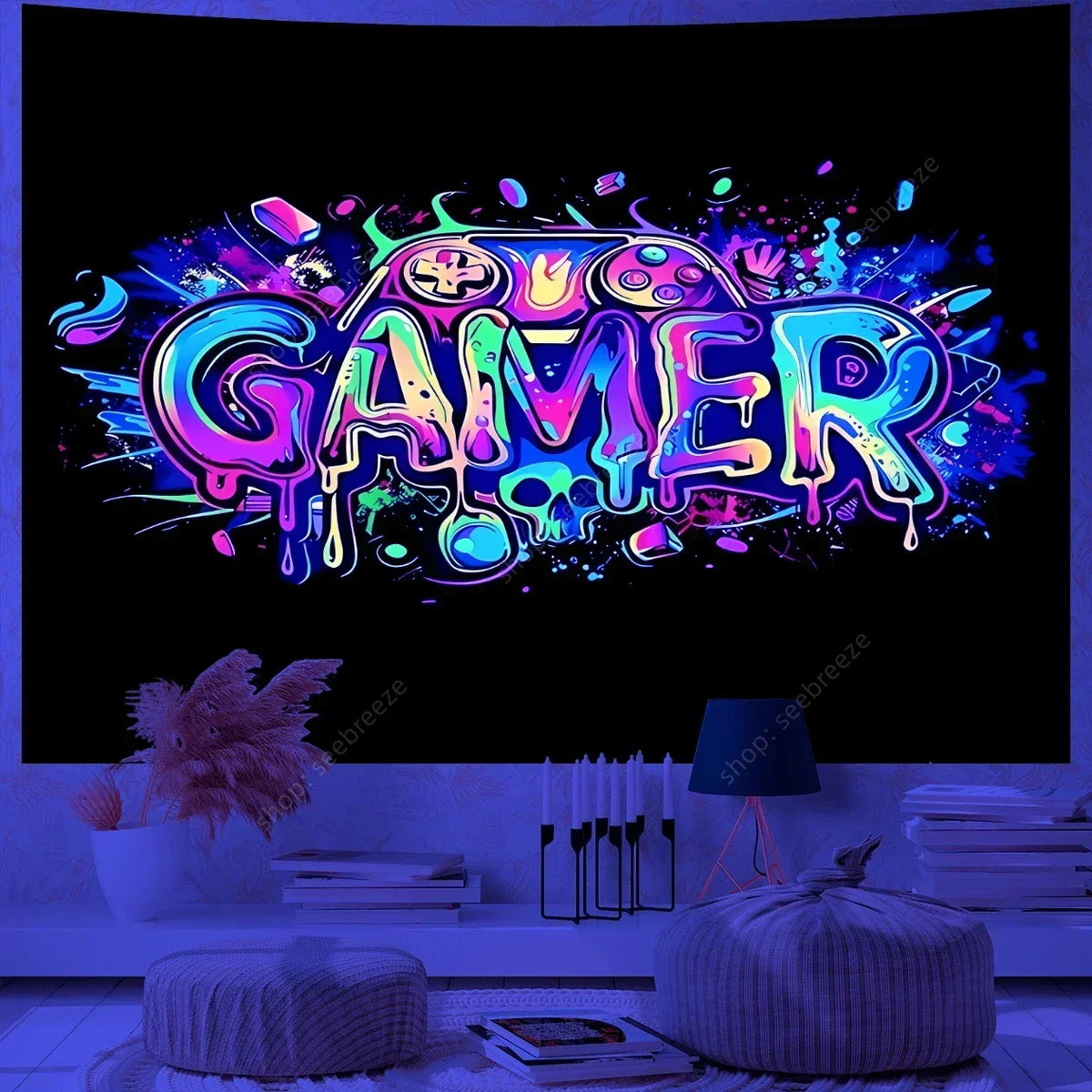A vibrant, colorful, splatter-style graphic spelling the word GAMER in neon and holographic colors against a black background