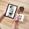A hand holds a tablet displaying an illustration of reusable wheat straw finger chopsticks next to a glass of iced beverage a