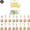 A set of 25 fairy cupcake toppers featuring a happy birthday design on a green cake stand.
