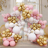 A balloon garland arch kit featuring pastel pink and white balloons arranged in a decorative display.