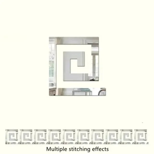 A close-up view of a white 3D acrylic mirror wall sticker featuring an ornate corner design.