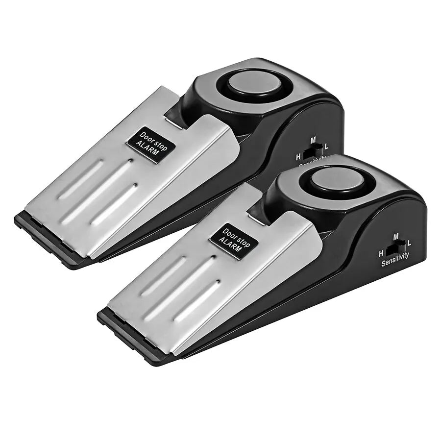 A black dual door stop security alarm set with silver plates and sensitivity settings.