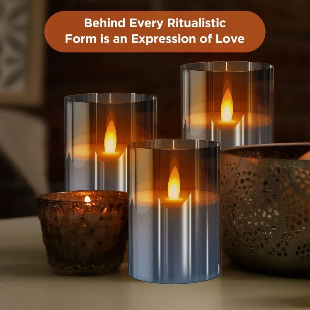 A set of LED flameless candles with flickering flame effects displayed in various glass holders.