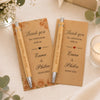 Two kraft paper thank you cards with engraved bamboo pens for Emma & Philou wedding.