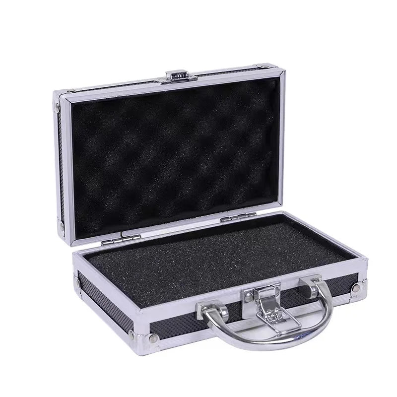 A silver aluminum storage box for a tattoo machine with reinforced corners and a hinged lid.