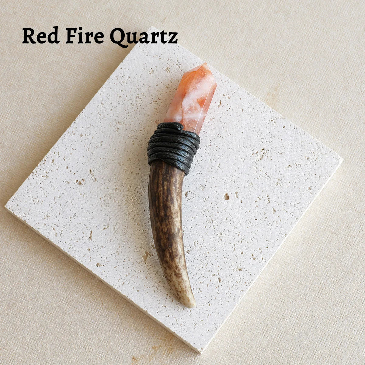 A natural Red Fire Quartz crystal mounted on a dark wood scepter wand for spiritual decor.