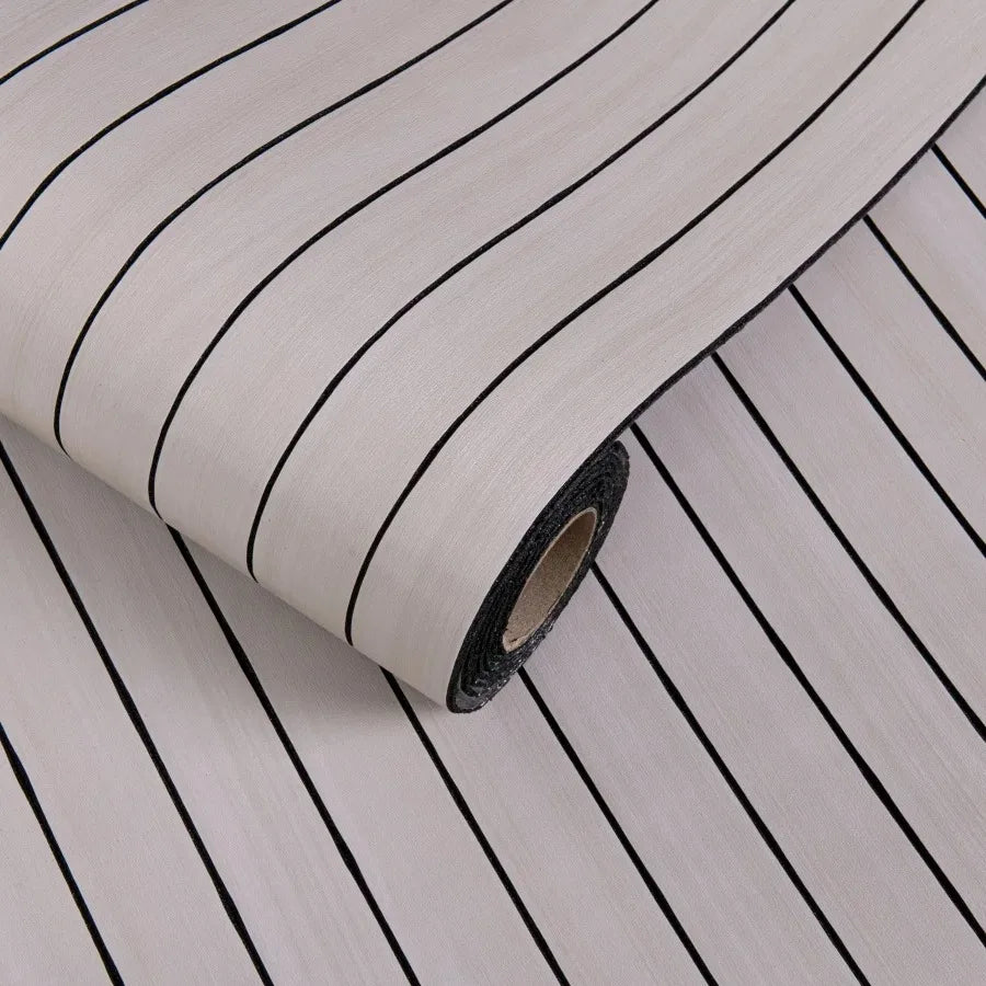 Roll of self-adhesive 3D wood grain wall panels showing the textured surface and black edge.