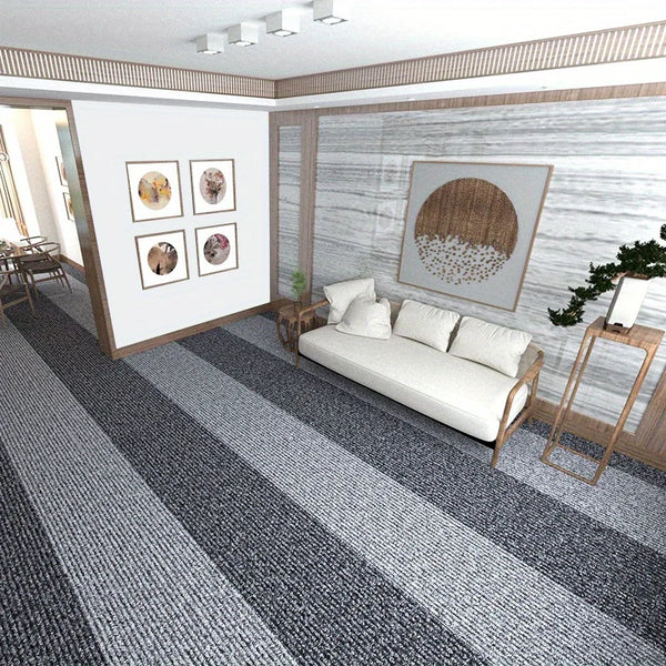 A modern living room featuring a white sofa, wooden accents, and a gray and white striped runner rug.