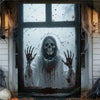 A spooky Halloween window banner featuring a ghostly skull figure with blood splatter and spiderwebs.
