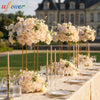A long table display featuring silk champagne roses and hydrangea flower ball centerpieces.