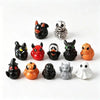 A collection of quirky mini resin duck figurines featuring spooky designs and various animal faces.