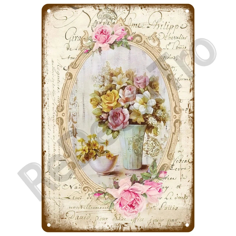 Vintage metal tin sign featuring a floral arrangement within an oval frame on aged paper.