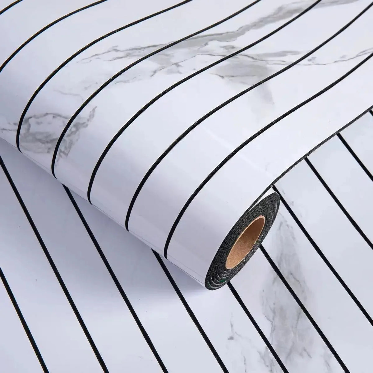 Roll of self-adhesive 3D wood grain wall panels with black and white stripes on a marble background