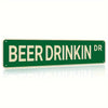 Green rectangular metal sign with white text that reads BEER DRINK DR
