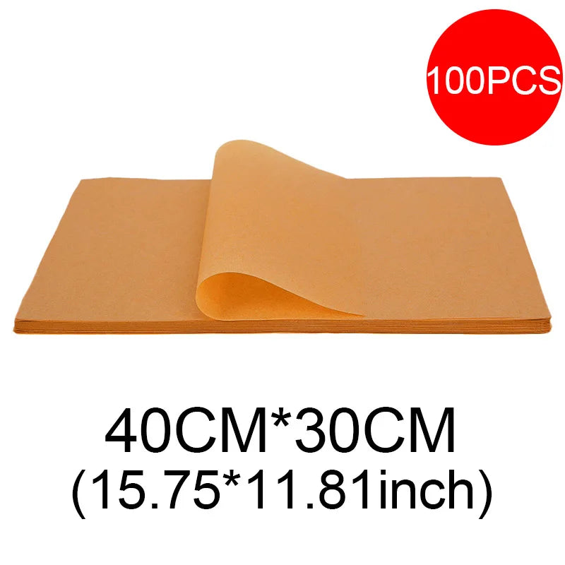 A stack of 100 non-stick baking sheets, measuring 40cm by 30cm.