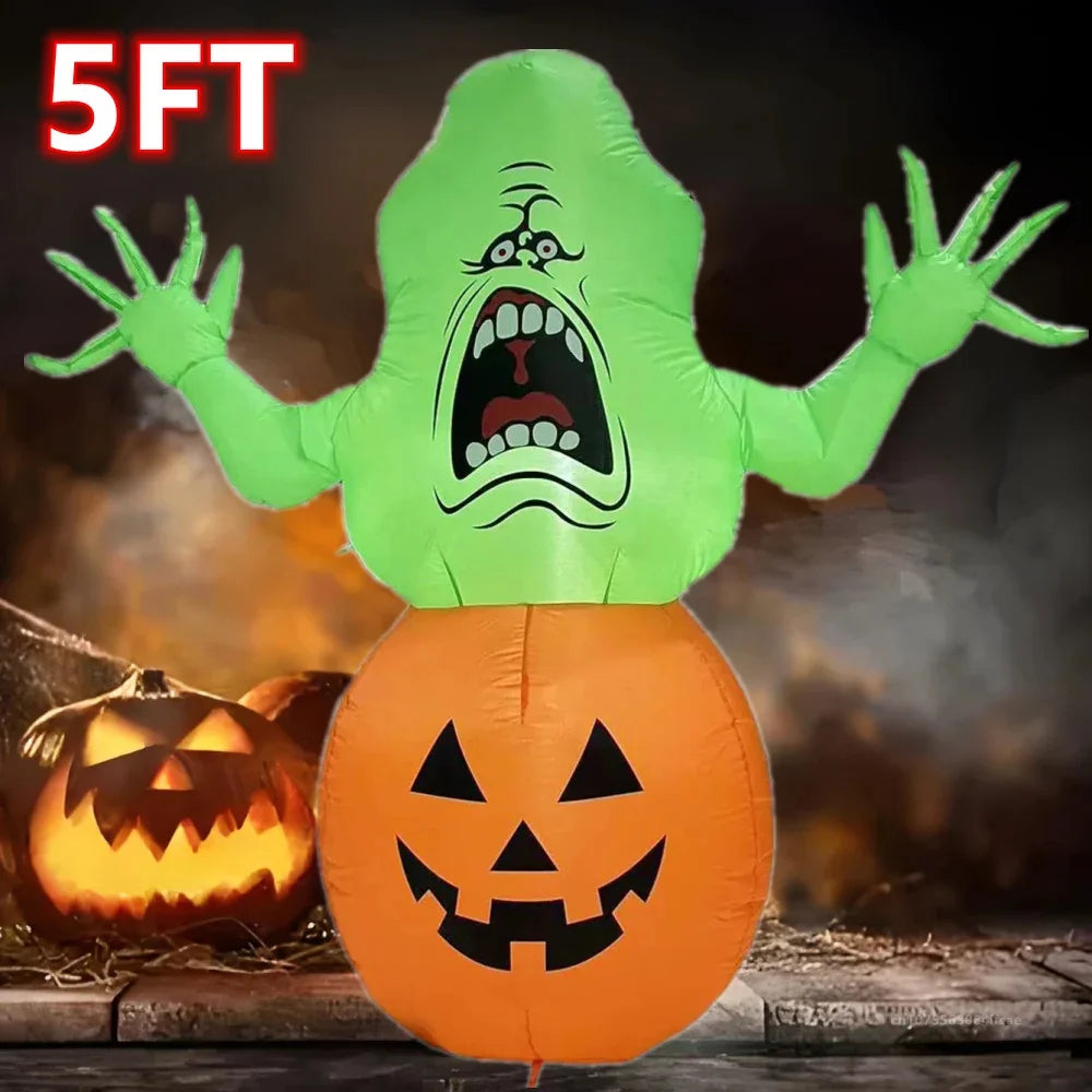 A lime green inflatable monster decoration with a screaming face stands above an orange pumpkin.