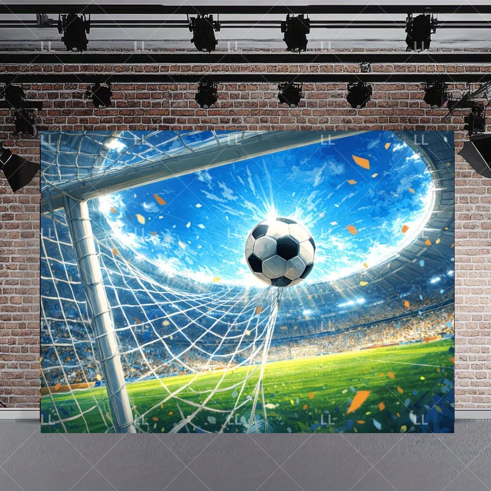 A soccer ball is suspended in a net against a bright blue sky backdrop for a birthday celebration.
